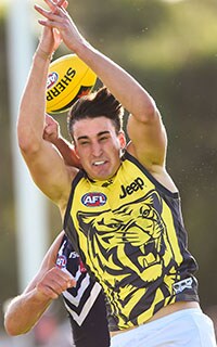 AFL 2016 NAB Challenge - Fremantle v Richmond MANDURAH, AUSTRALIA - FEBRUARY 19: Ivan Soldo of the Richmond Tigers has a mark slip through his fingers during the 2016 NAB Challenge match between the Fremantle Dockers and the Richmond Tigers at Rushton Park, Mandurah on February 19, 2016. (Photo by Daniel Carson/AFL Media)